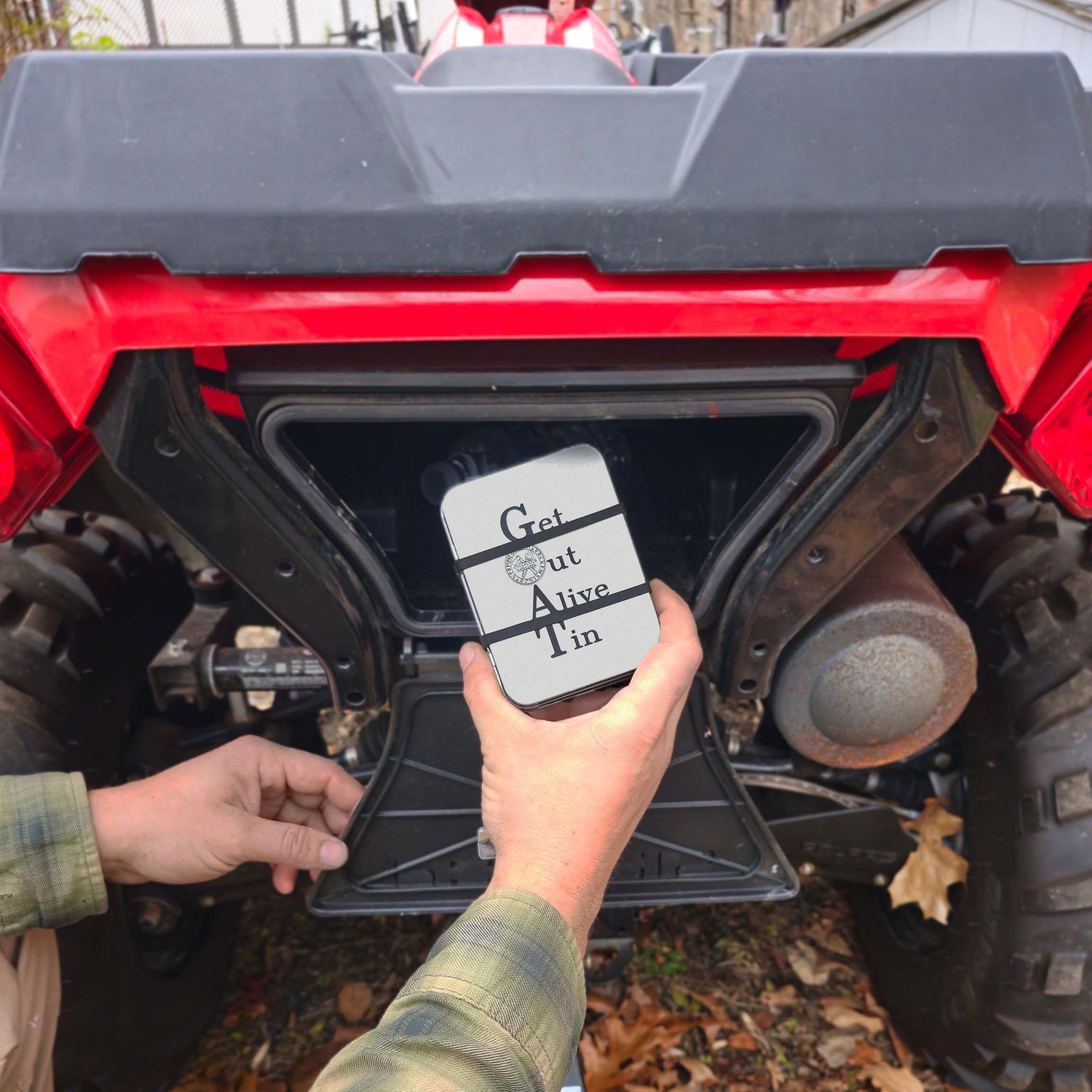 First Aid Kit & Get Out Alive Tin (GOAT) placed in ATV