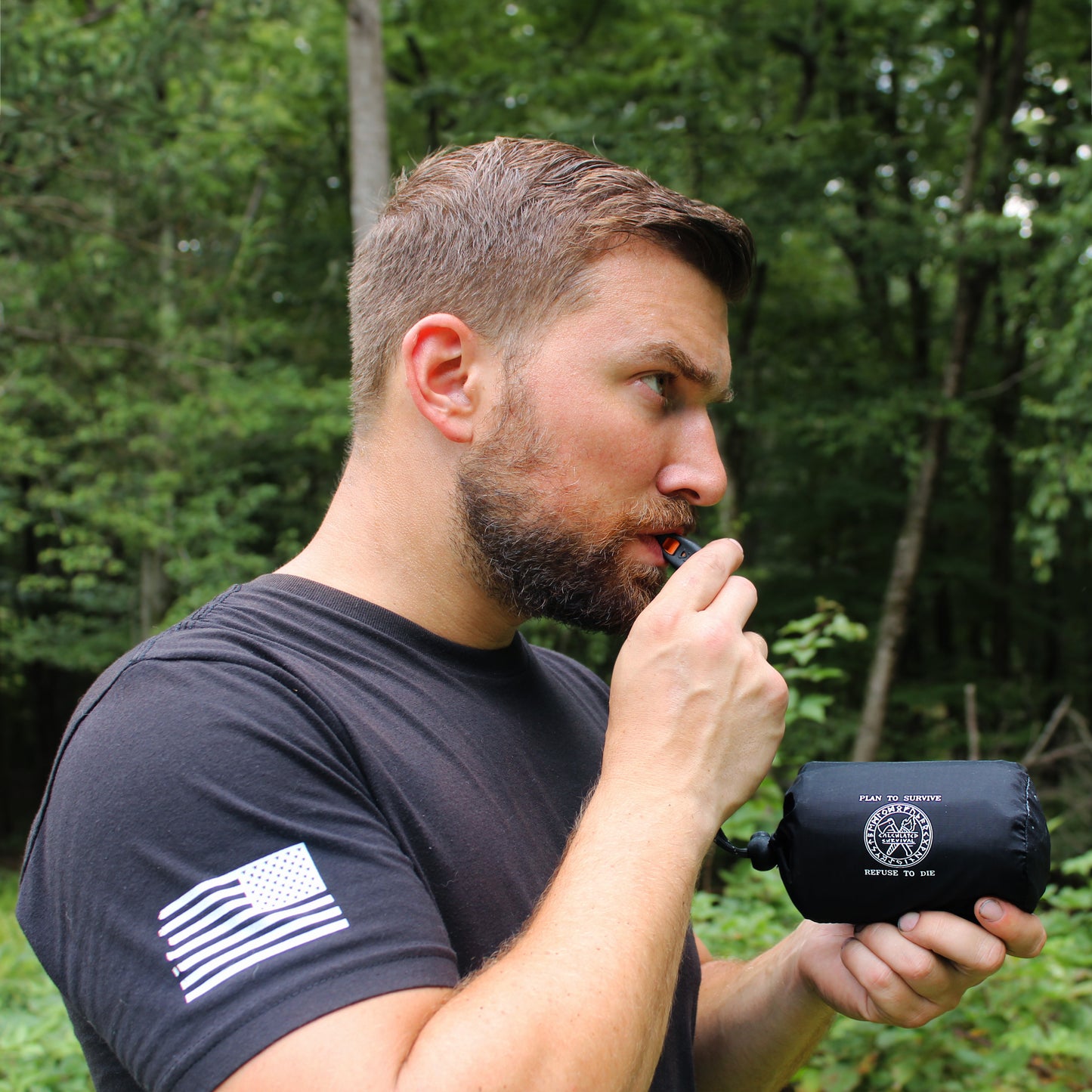 Whistle connected to Mylar Emergency Tube Tent