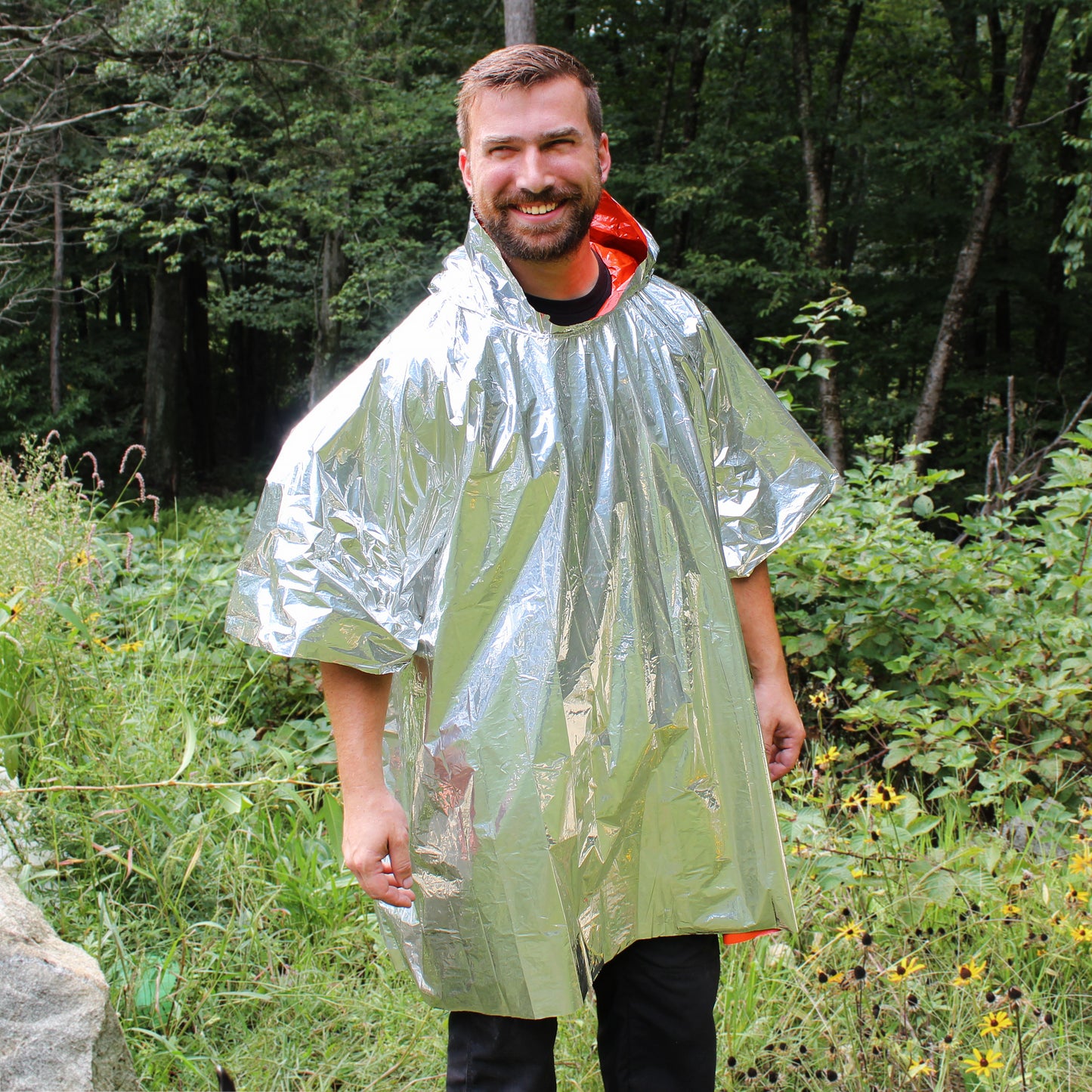 Person wearing Emergency Mylar Poncho