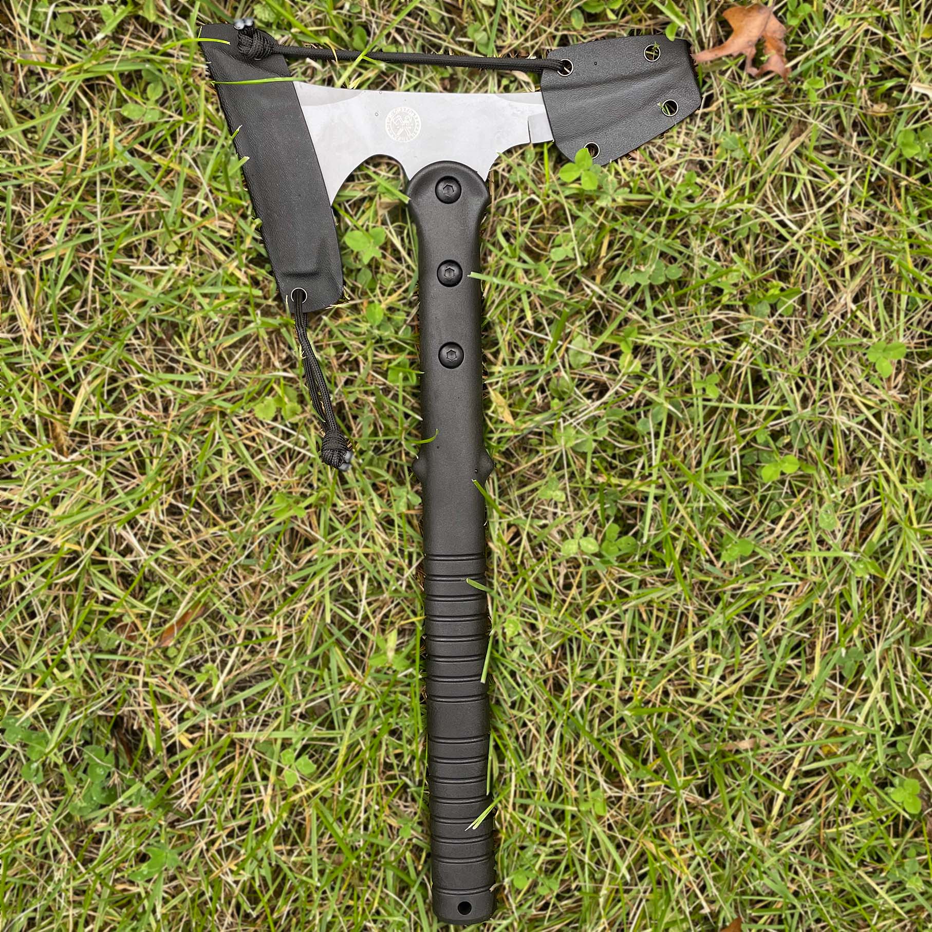 Throwing Hatchet in grass